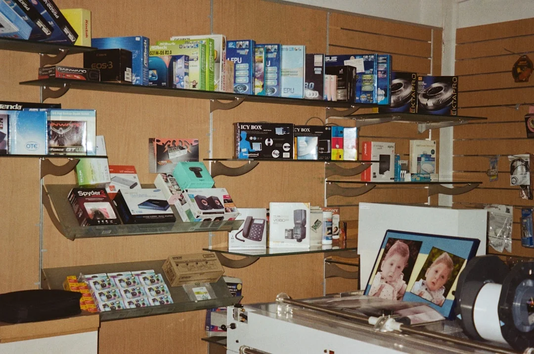 a room filled with lots of books and electronics